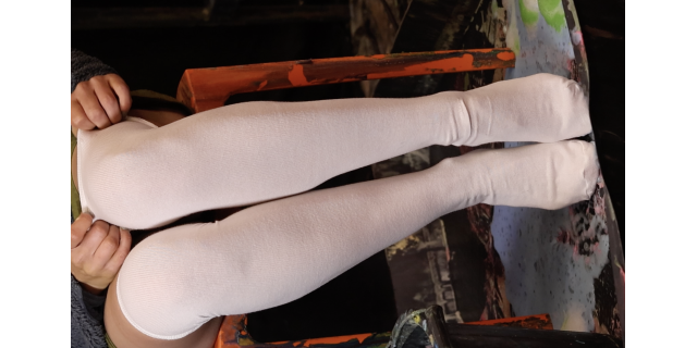 Kimberly ruins a pair of white knee socks