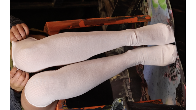 Kimberly ruins a pair of white knee socks